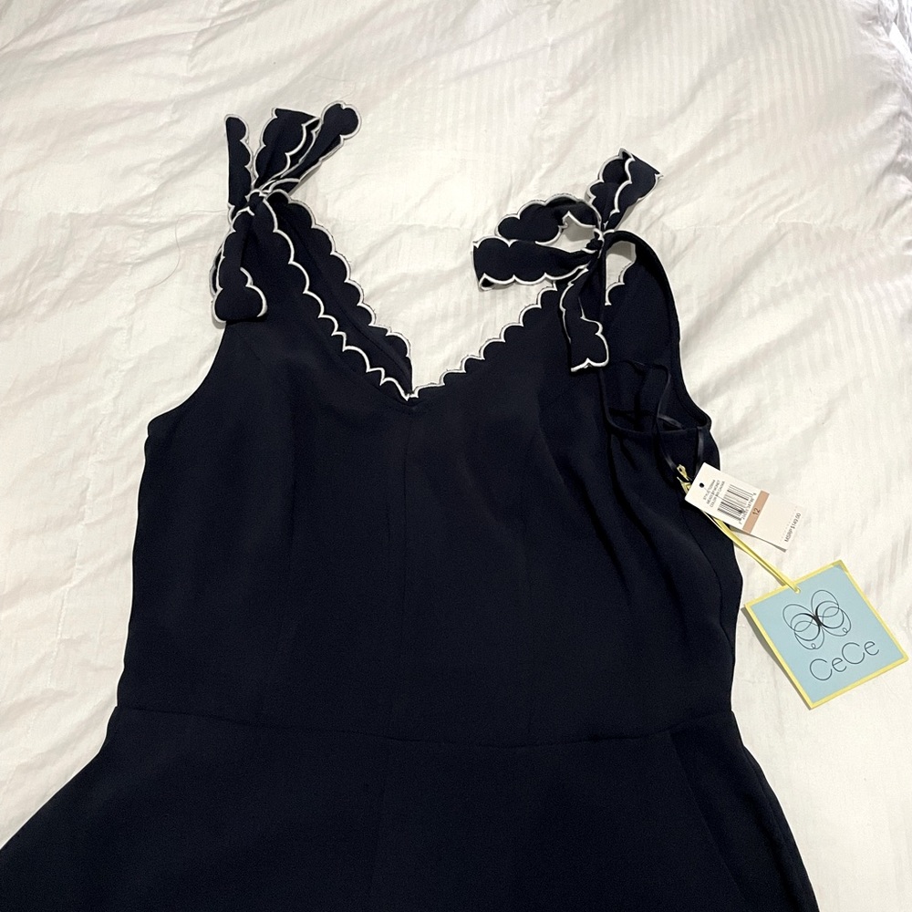 Cece Sleeveless Tie Shoulder Bow Pockets Scallop Cropped Jumpsuit in Navy NWT
